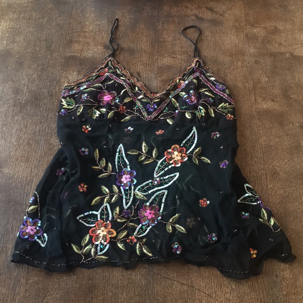 Camisole tank with sequence flowers.